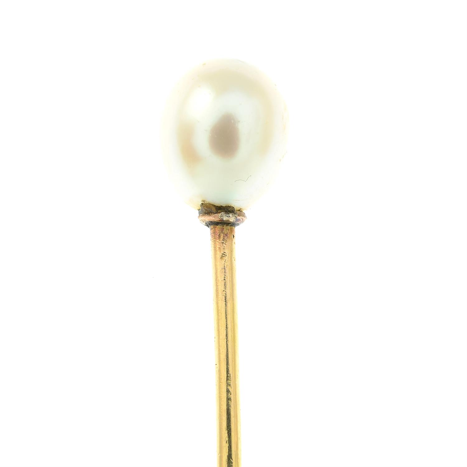 A natural saltwater pearl stickpin.