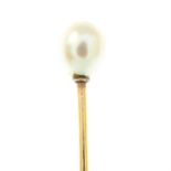 A natural saltwater pearl stickpin.