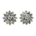 A pair of 9ct gold brilliant-cut diamond cluster earrings.