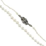 A seed pearl single-strand necklace, with single-cut diamond push-piece clasp.