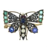 An early 20th century gold gem-set butterfly brooch.