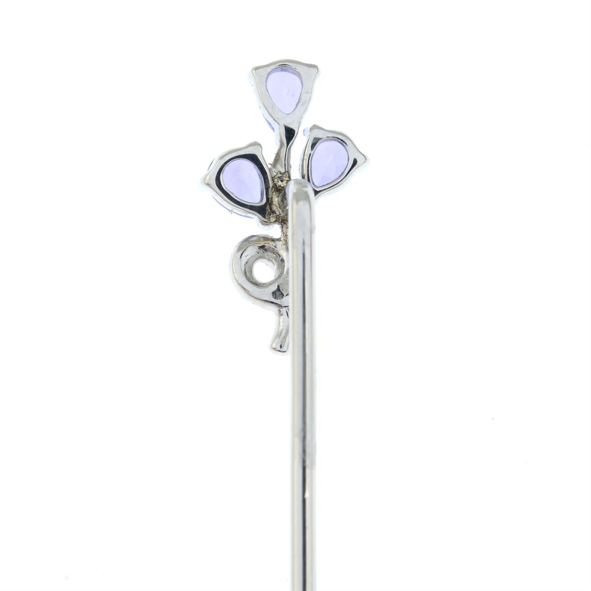 A tanzanite and diamond floral stick pin. - Image 3 of 3