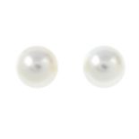 A pair of cultured pearl stud earrings.