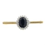 A 9ct gold sapphire and diamond brooch.