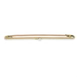 An early 20th century platinum and 15ct gold seed pearl bar brooch.