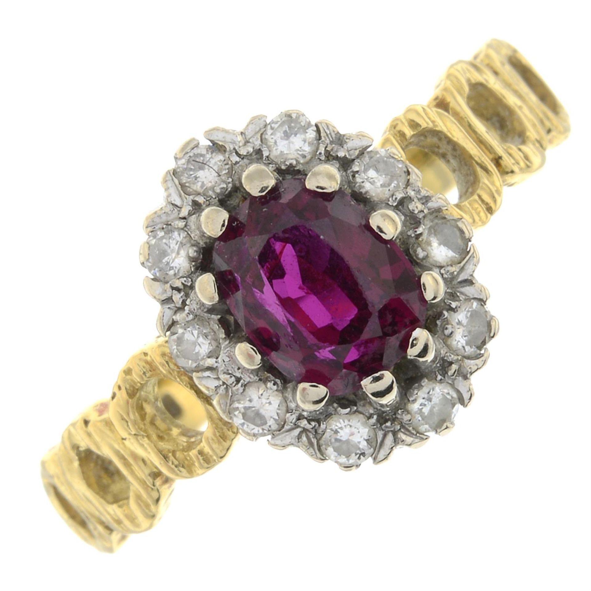 An 18ct gold ruby and brilliant-cut diamond cluster ring.