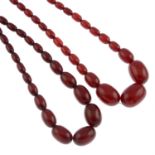 Two graduated red Bakelite bead necklaces.