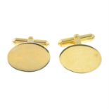 A pair of 9ct gold oval cufflinks.