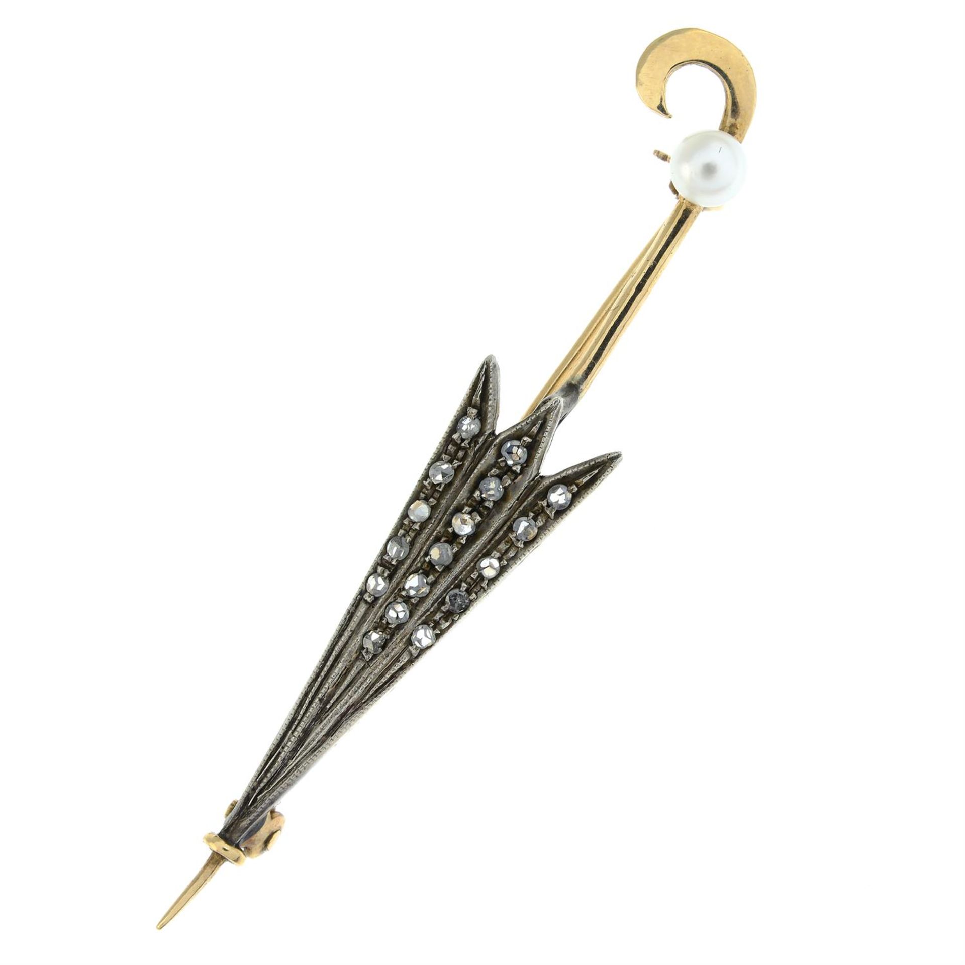 An early 20th century silver and gold, rose-cut diamond and seed pearl umbrella brooch.