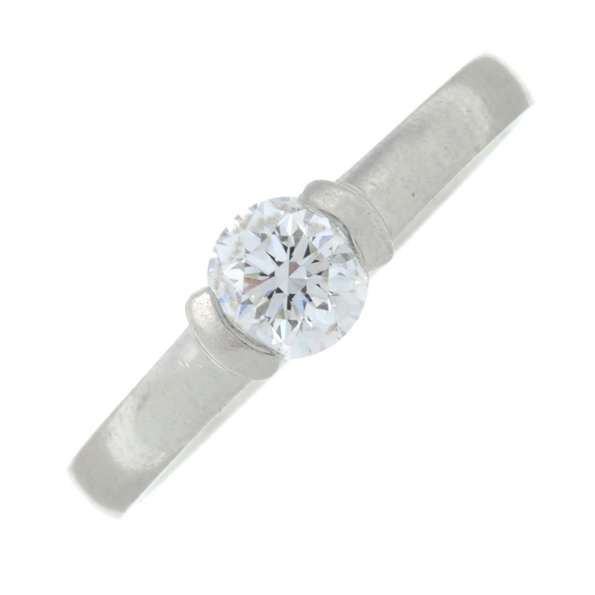 A platinum brilliant-cut diamond single-stone ring.