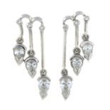 A pair of 18ct gold diamond drop earrings.