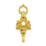 An early 19th century gold watch key.