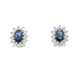 A pair of 9ct gold sapphire and single-cut diamond cluster earrings.