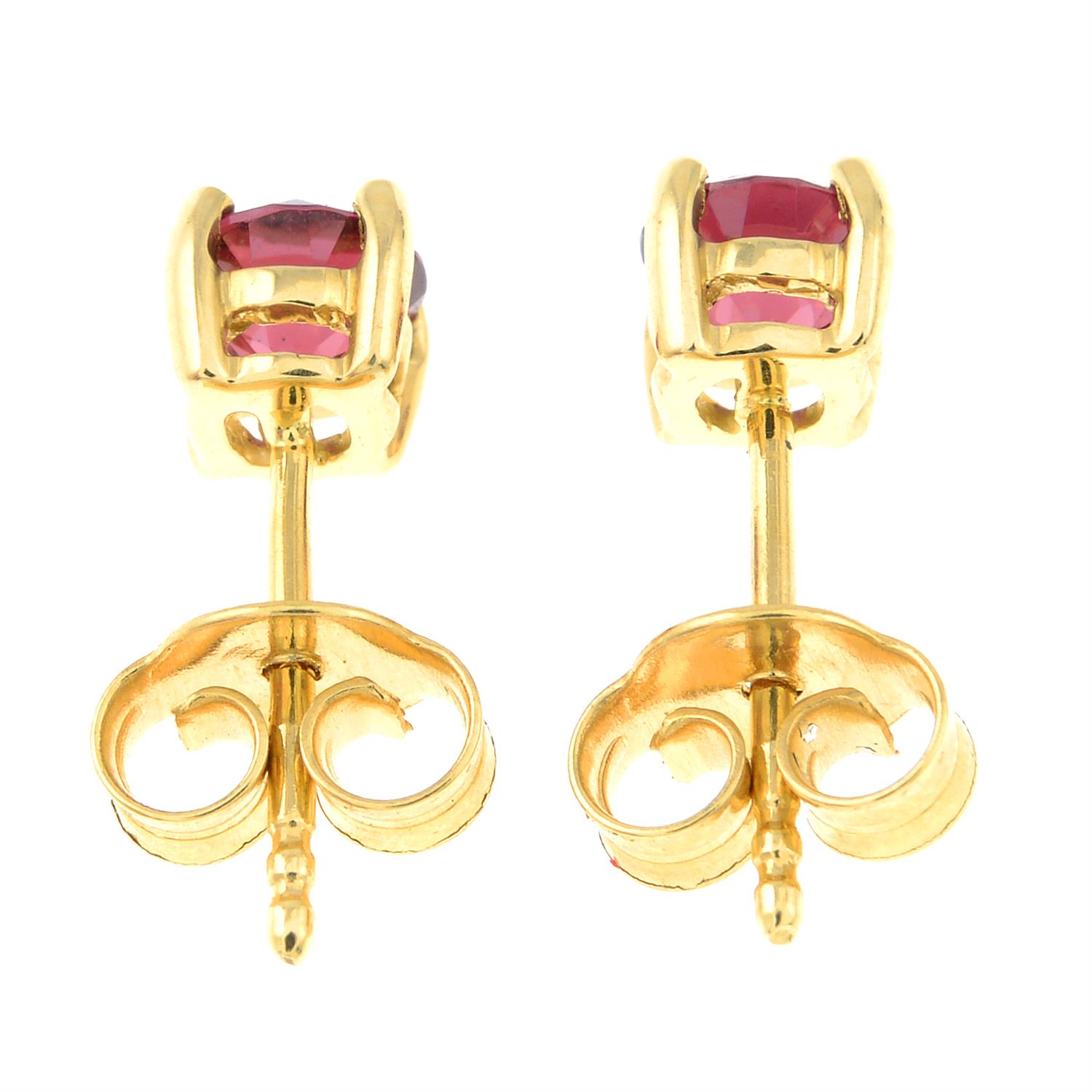 A pair of rhodolite garnet stud earrings. - Image 2 of 2
