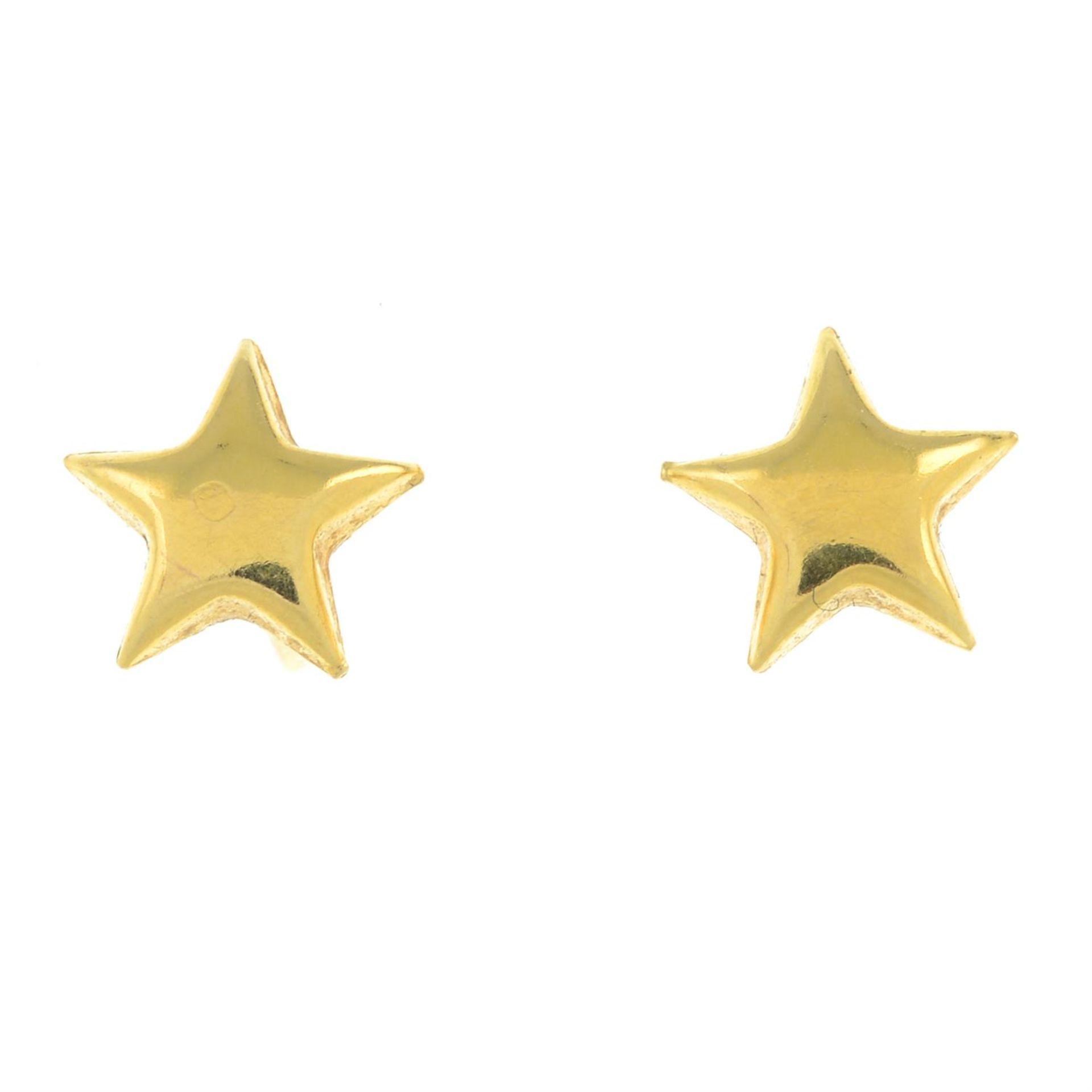 A pair of star stud earrings.