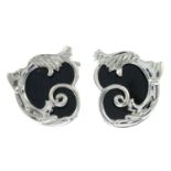 A pair of silver onyx cufflinks, by PD Man.