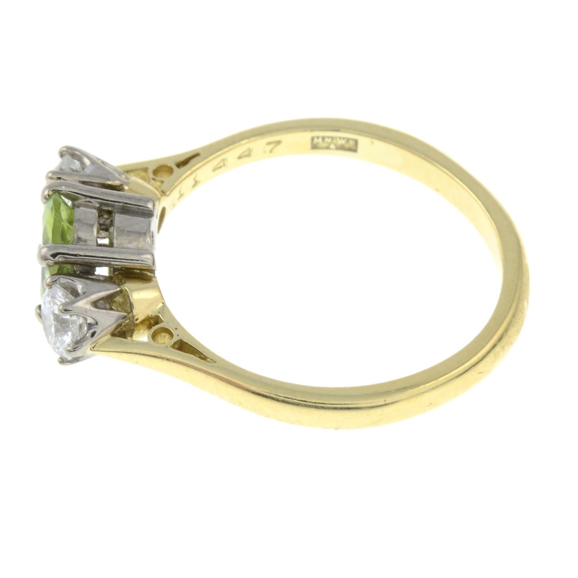 An 18ct gold peridot and diamond three-stone ring. - Image 2 of 3