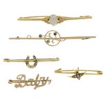 Five early to mid 20th century gold gem-set bar brooches.