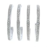 Five pairs of large enamel crystal hoop earrings, by Karl Largerfeld.