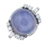 A star sapphire and diamond ring.