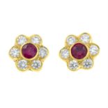 A pair of 18ct gold ruby and diamond cluster earrings.