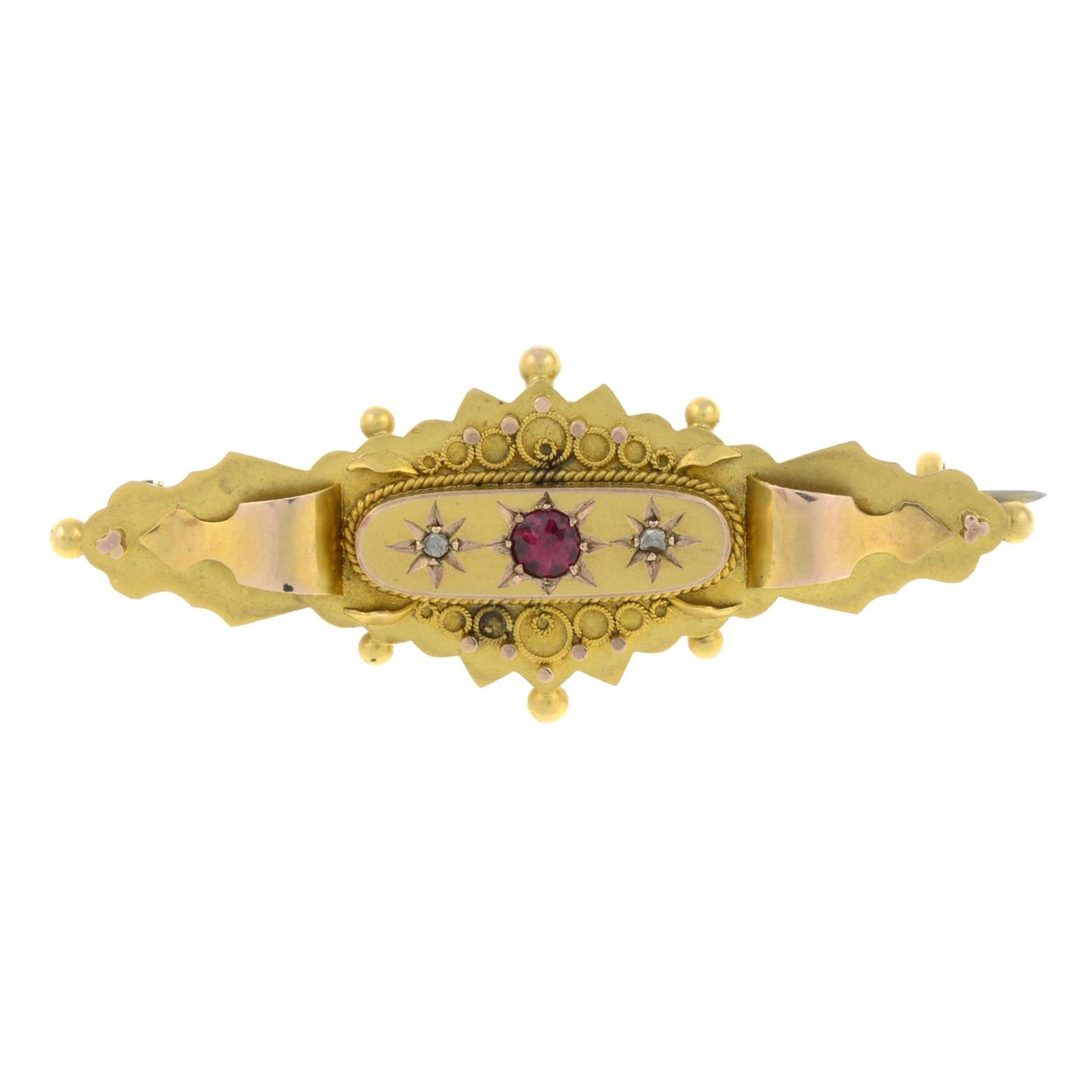 An early 20th century 9ct gold garnet-topped-doublet and rose-cut diamond brooch.