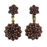 A pair of garnet cluster drop earrings.