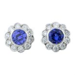 A pair of 18ct gold sapphire and diamond cluster earrings.