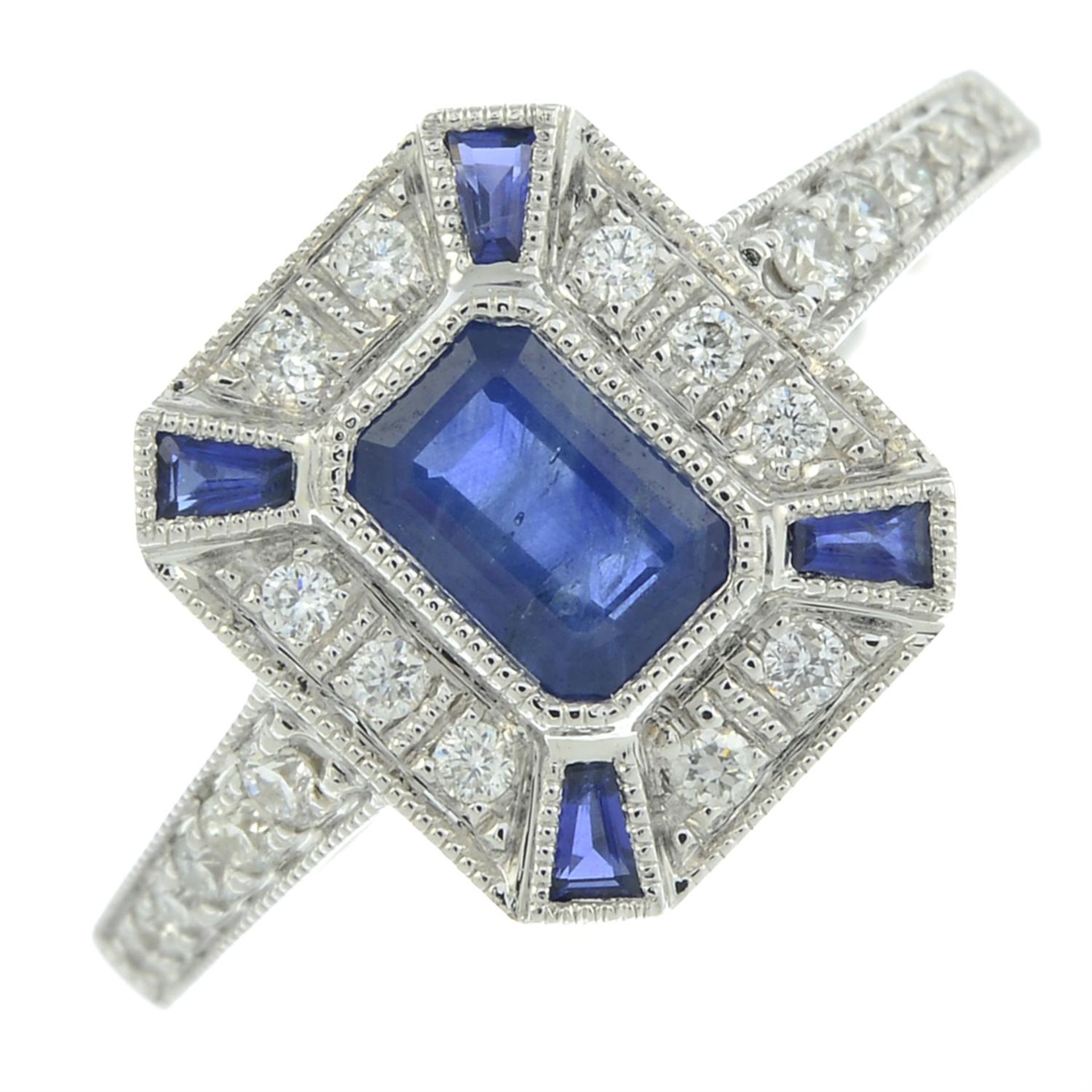 An 18ct gold sapphire and diamond dress ring.