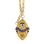 An early 20th century 9ct gold enamel 'President' medallion fob, suspended from a 9ct gold Albert