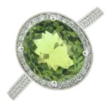 A peridot and diamond cluster ring.