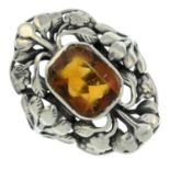 An Arts & Crafts silver citrine ring, attributed to Bernard Instone.