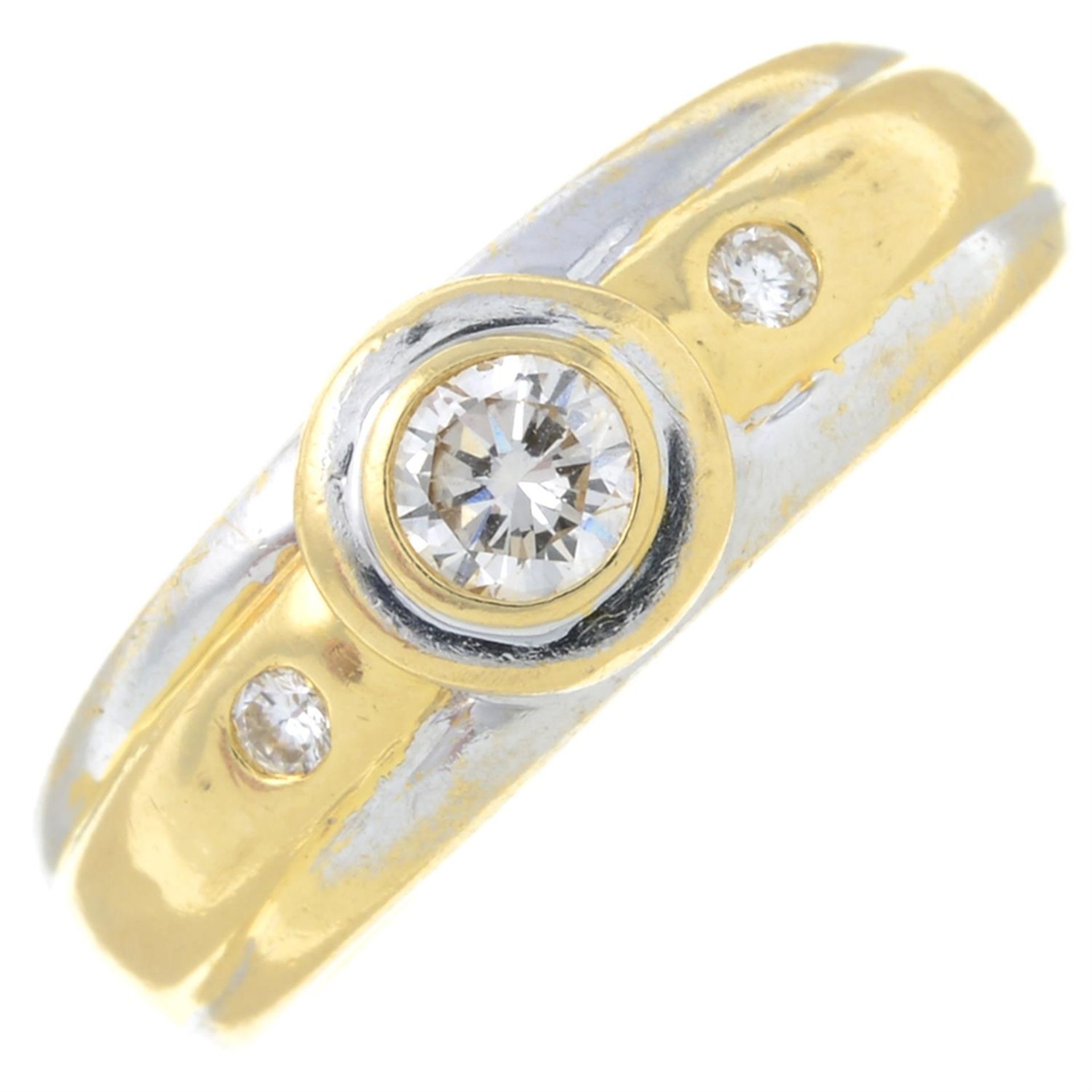 A brilliant-cut diamond band ring.