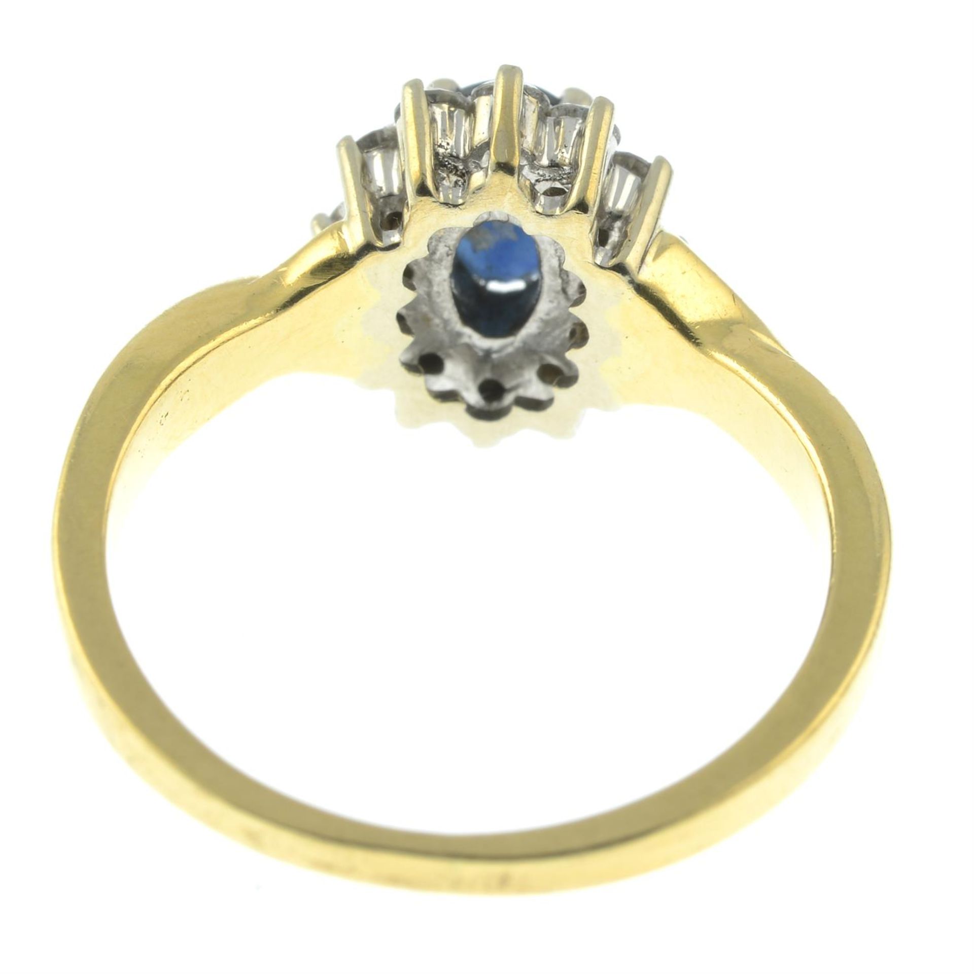 A sapphire and diamond cluster ring. - Image 3 of 3