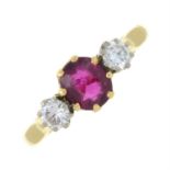 An 18ct gold ruby and diamond three-stone ring.