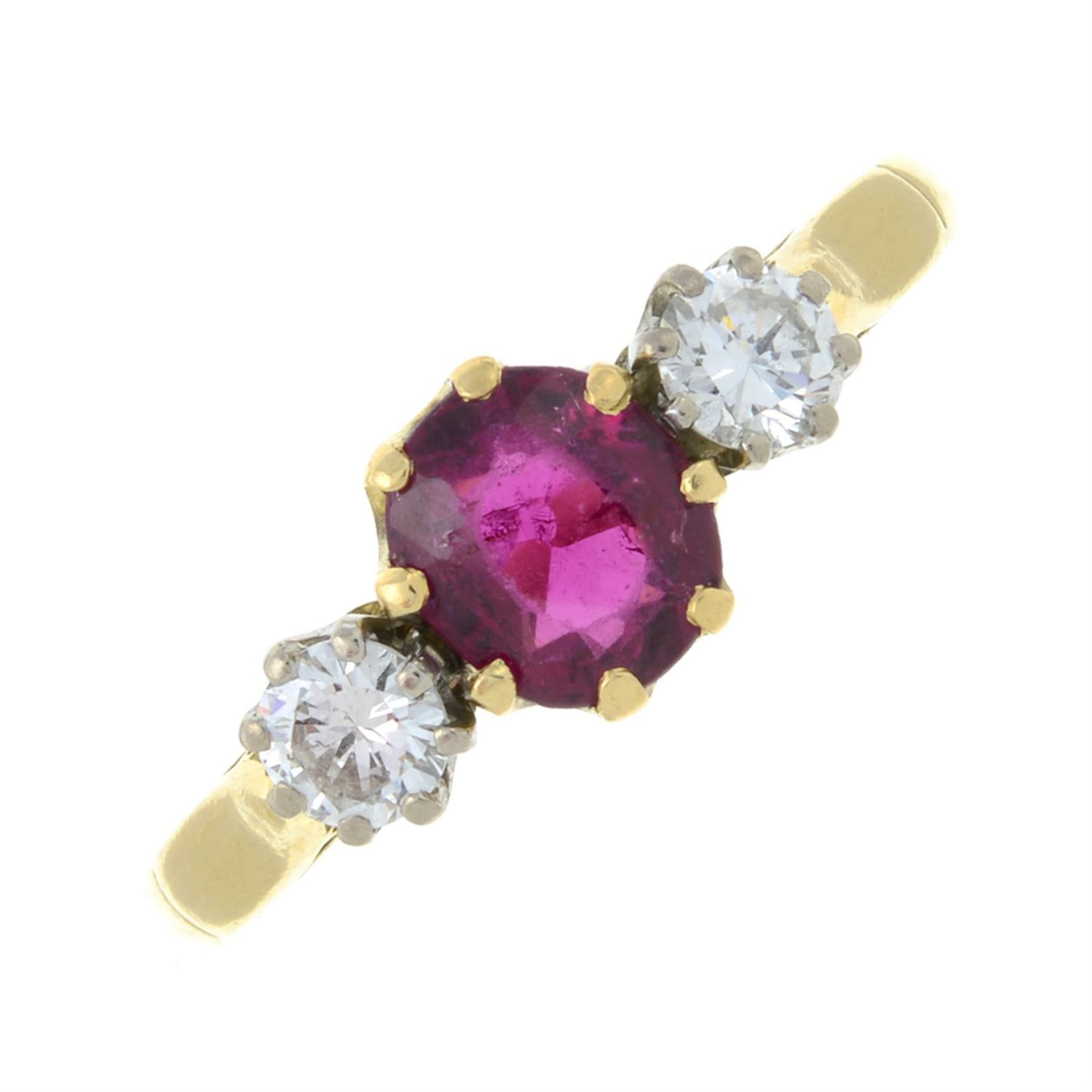 An 18ct gold ruby and diamond three-stone ring.