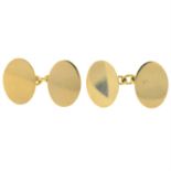 A pair of 9ct gold oval cufflinks.