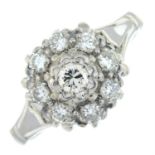 A brilliant-cut diamond cluster ring.