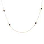 An 18ct gold garnet bead necklace.