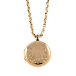 An early 20th century gold locket pendant, with chain.