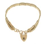 An early 20th century 9ct gold bracelet, with heart-shape lock clasp.