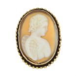 A shell cameo brooch, depicting a cherub.
