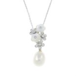 A cultured pearl, diamond and mother of pearl drop pendant, suspended from a chain.