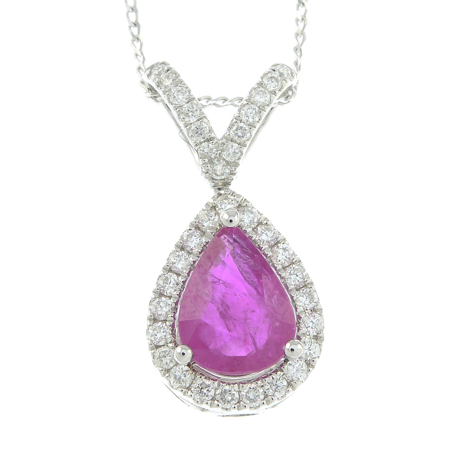 An 18ct gold ruby and diamond pendant, with chain.