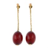 A pair of early 20th century 9ct gold red Bakelite earrings.