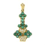 An emerald and brilliant-cut diamond pendant.