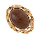 A goldstone single-stone ring.