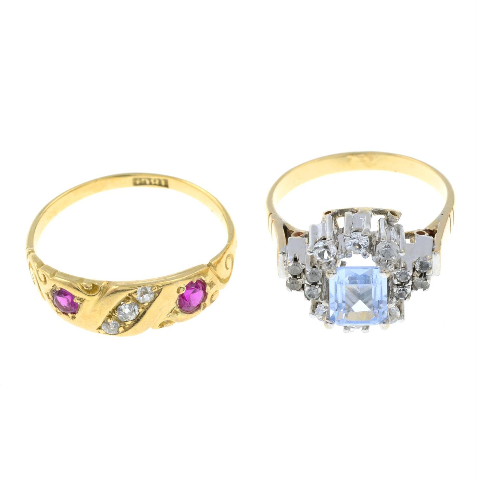 Two gem-set rings.