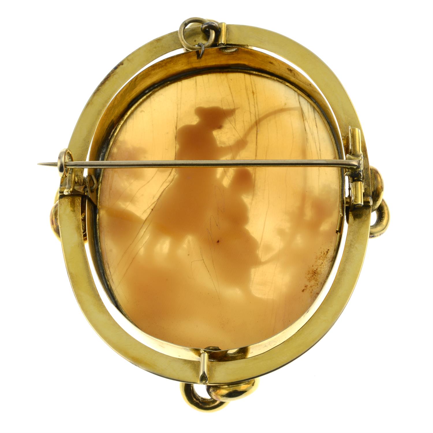 A Victorian gold shell cameo brooch, carved to depict a pastoral scene of a couple fishing. - Image 2 of 2