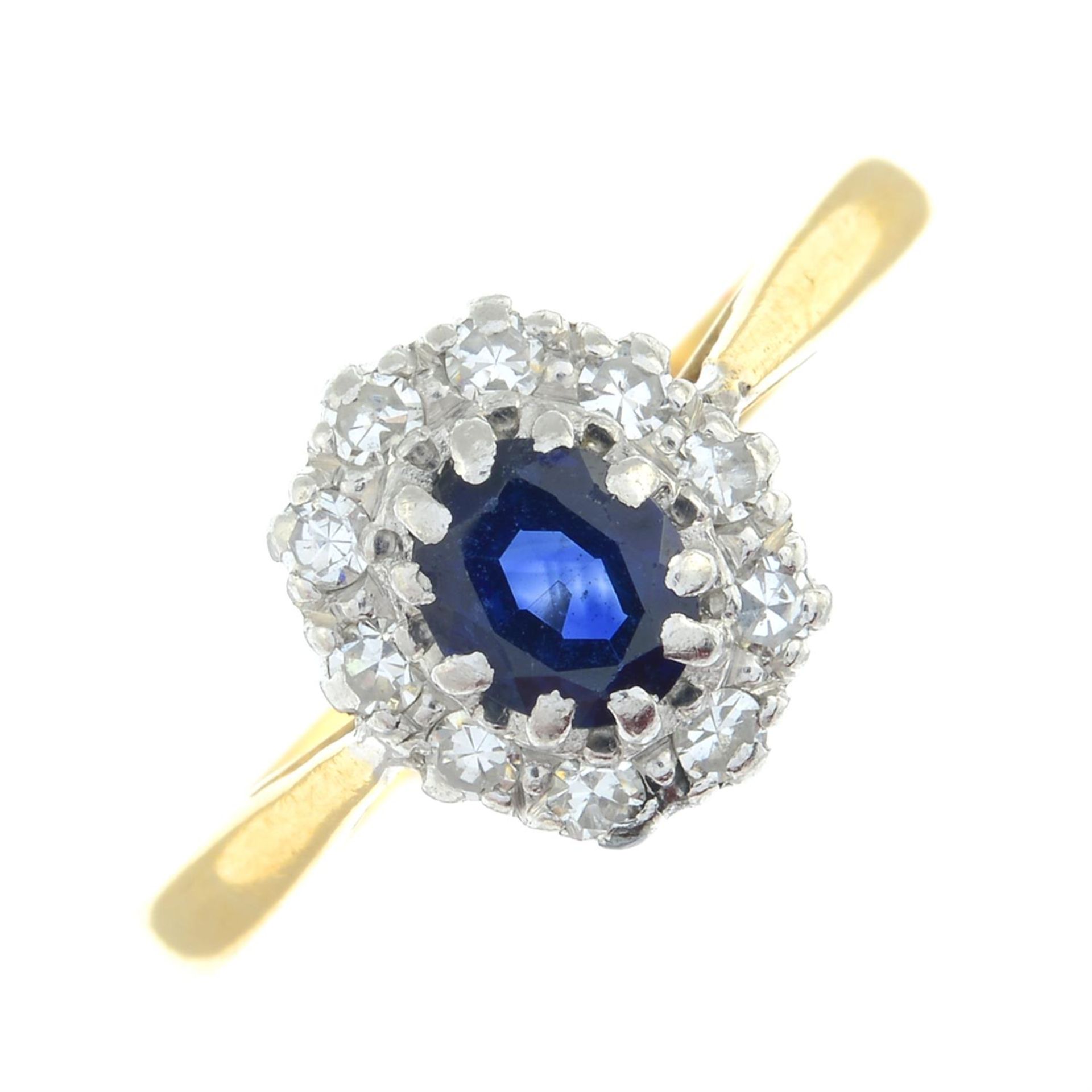 A sapphire and single-cut diamond cluster ring.